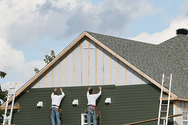 Professional Emergency Siding Repair technician working in West Columbia, TX